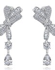 Pear and Round Cut Cubic Zirconia Drop Bow Tie Bridal Earrings in Platinum-Plated Sterling Silver - Boutique Pavè