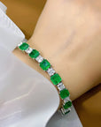 Princess Cut Emerald Green and Clear Cubic Zirconia Statement Tennis Bracelet in Platinum-Plated Sterling Silver - Boutique Pavè