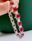 Princess Cut Ruby Red and Clear Cubic Zirconia Statement Tennis Bracelet in Platinum-Plated Sterling Silver - Boutique Pavè