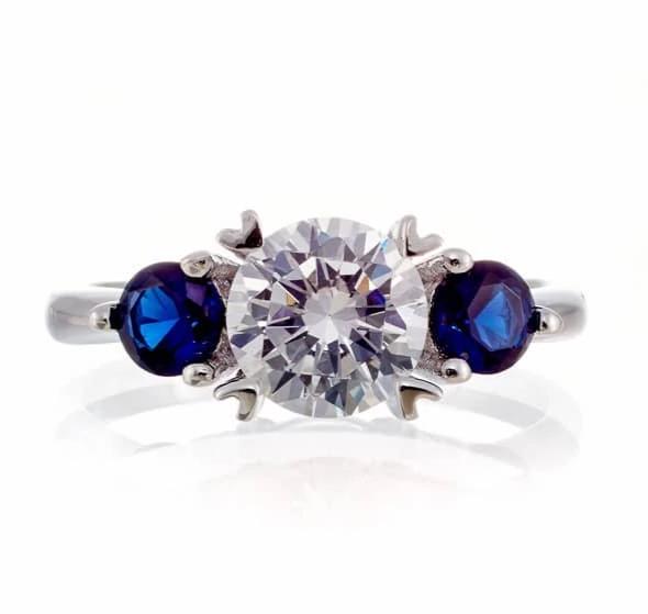 Round and Sapphire Blue Accent Cubic Zirconia Engagement Ring - White Gold Plated Sterling Silver - Boutique Pavè