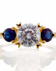 Round and Sapphire Blue Accent Cubic Zirconia Engagement Ring - Yellow Gold Plated Sterling Silver - Boutique Pavè
