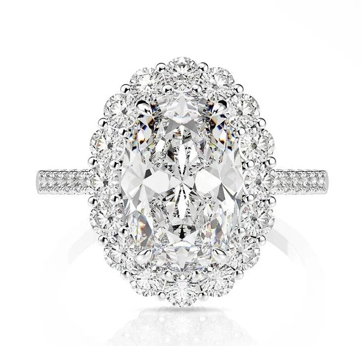 Three Carat Brilliant Oval Cut Cubic Zirconia Fancy Halo Engagement Ring in Platinum Plated Sterling Silver - Boutique Pavè
