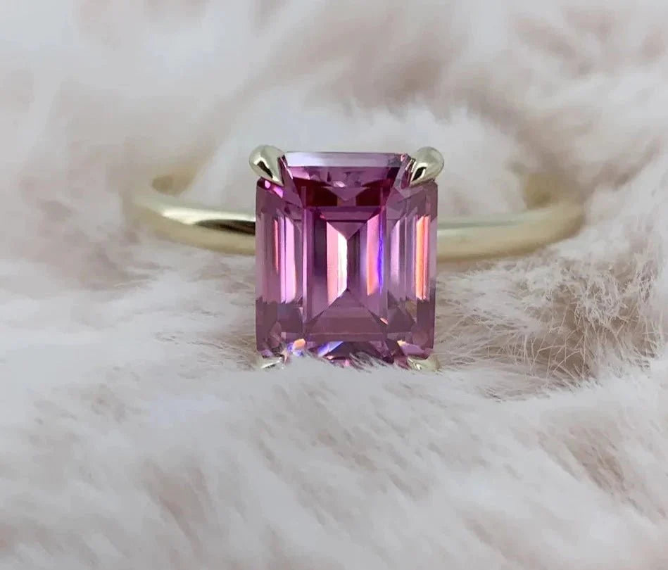 Three Carat Emerald Cut Fancy Pink Moissanite Solitaire Engagement Ring in 18 Karat Yellow Gold - Boutique Pave