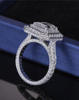 Three Carat Emerald Cut Lab Created Diamond Double Halo Engagement Ring in 14 Karat Gold - Boutique Pavè