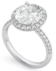 Three Carat Oval Cut Moissanite Halo Engagement Ring in 18 Karat White Gold - Boutique Pavè