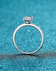 Two Carat Brilliant Emerald Cut Moissanite Pave Solitaire Engagement Ring in Platinum Plated Sterling Silver - Boutique Pavè
