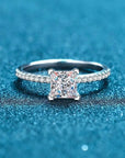 Two Carat Brilliant Princess Cut Moissanite Pave Solitaire Engagement Ring in Platinum Plated Sterling Silver - Boutique Pavè