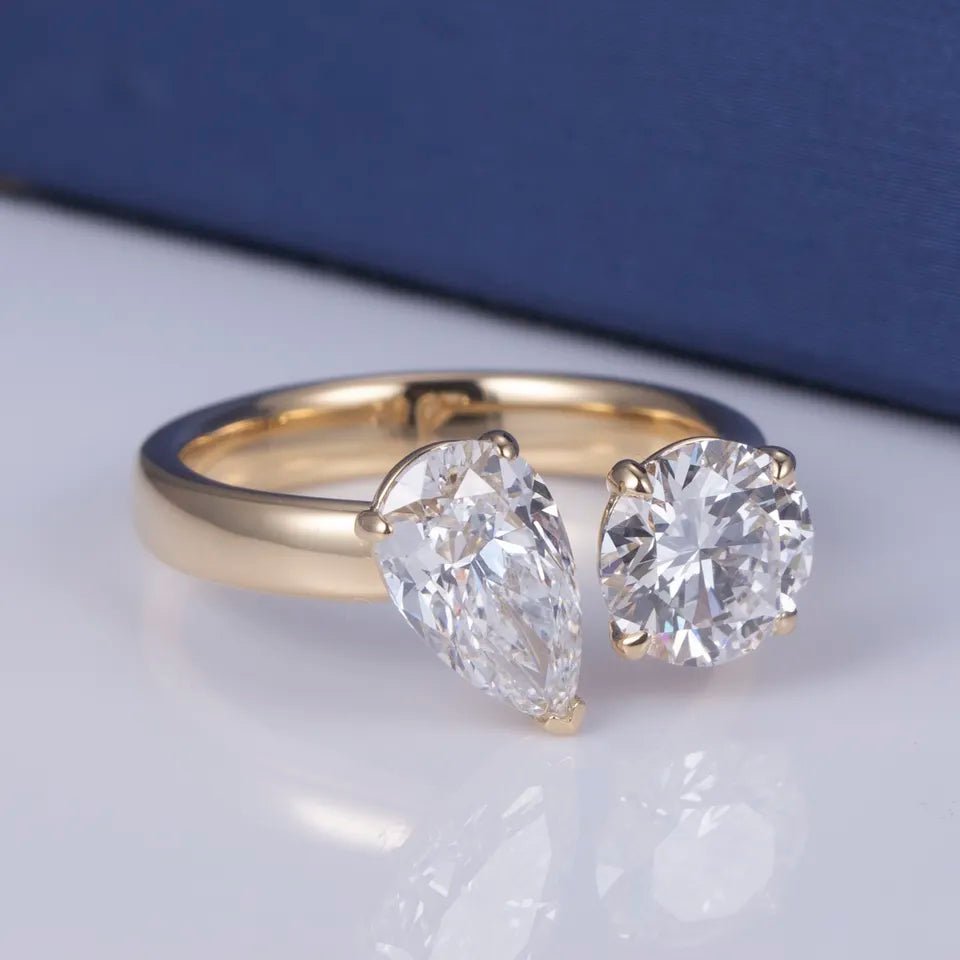 Two Carat Brilliant Round and Pear Cut Lab Created Diamond Moi et Toi Engagement Ring in 18 Karat Gold - Boutique Pavè