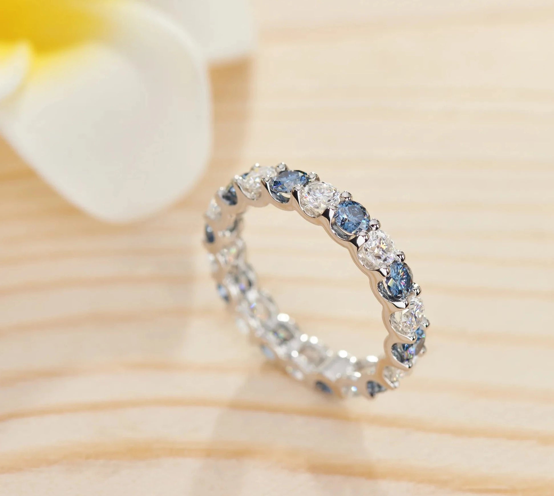 Two Carat Brilliant Round Cut White and Blue Moissanite Eternity Band in 14 Karat White Gold - Boutique Pavè