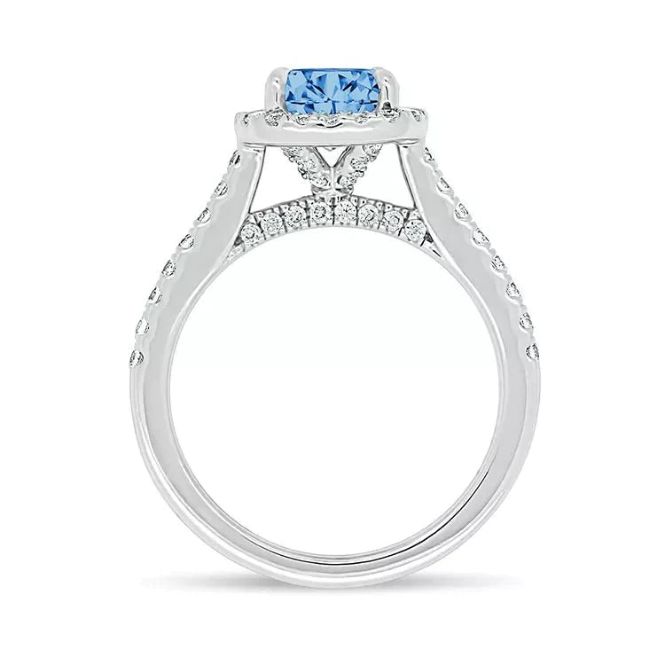 Two Carat Cushion Cut Blue Moissanite Halo Style Engagement Ring in 14 Karat White Gold - Boutique Pavè