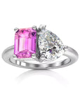 Two Carat Emerald and Pear Cut Moissanite and Lab Pink Sapphire Toi Et Moi Engagement Ring in 14 Karat White Gold - Boutique Pavè