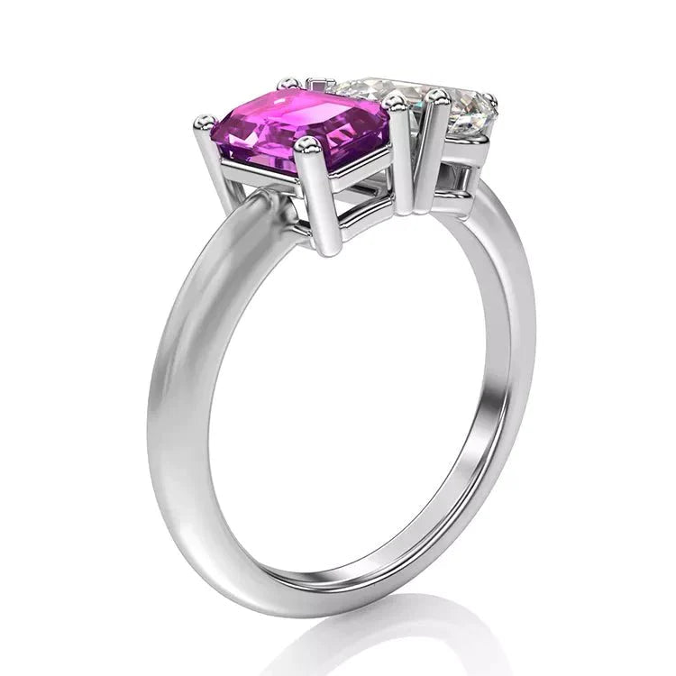 Two Carat Emerald and Pear Cut Moissanite and Lab Pink Sapphire Toi Et Moi Engagement Ring in 14 Karat White Gold - Boutique Pavè