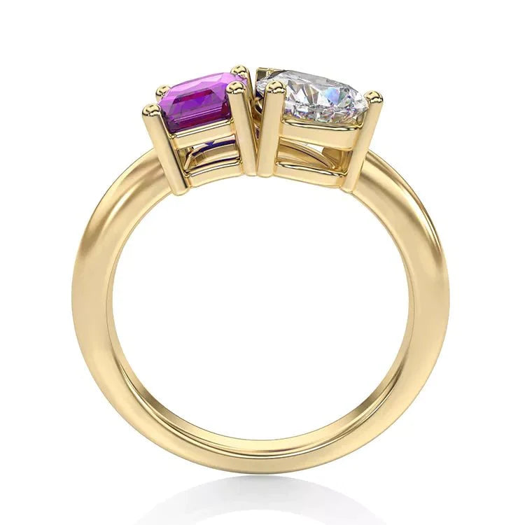 Two Carat Emerald and Pear Cut Moissanite and Lab Pink Sapphire Toi Et Moi Engagement Ring in 14 Karat Yellow Gold - Boutique Pavè