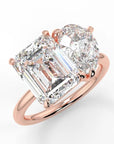 Two Carat Emerald and Pear Cut Moissanite Moi et Toi Engagement Ring in 14 Karat Rose Gold - Boutique Pavè