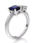 Two Carat Emerald Cut Lab Grown Blue Sapphire and Pear Cut White Moissanite Toi Et Moi Engagement Ring in 14 Karat White Gold - Boutique Pavè