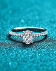 Two Carat Oval Cut Moissanite Pave Solitaire Engagement Ring in Platinum Plated Sterling Silver - Boutique Pavè