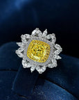 Two Carat Radiant Cut Fancy Yellow Cubic Zirconia Halo Statement Ring in Platinum Plated Sterling Silver - Boutique Pavè