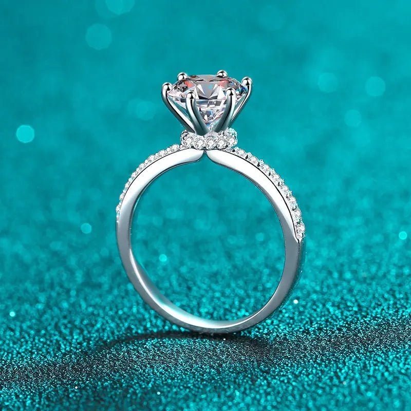 Two Carat Round Cut Moissanite Pave Solitaire Hidden Halo Engagement Ring in Platinum Plated Sterling Silver - Boutique Pavè