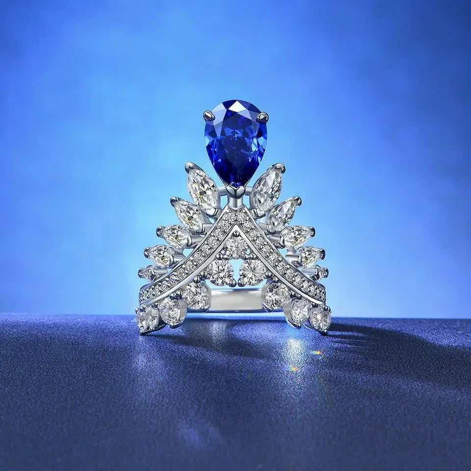 2 Carat Pear Cut Blue Sapphire Cubic Zirconia Feather Crown Engagement Ring in Platinum Plated  Sterling Silver - Boutique Pavè