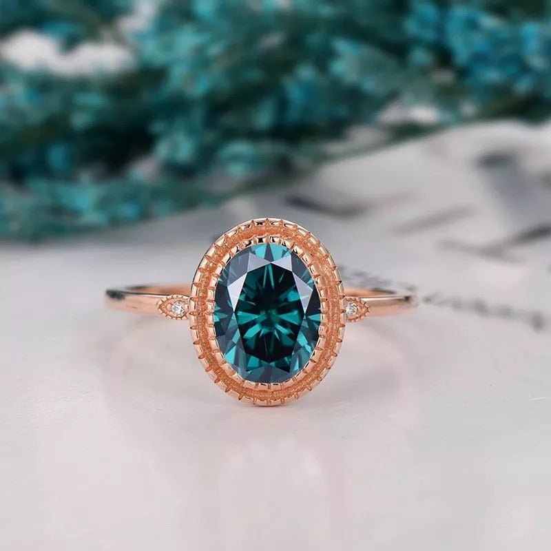 Unique Two Carat Oval Cut Genuine Blue Moissanite Engagement Ring in 14 Karat Rose Gold - Boutique Pavè