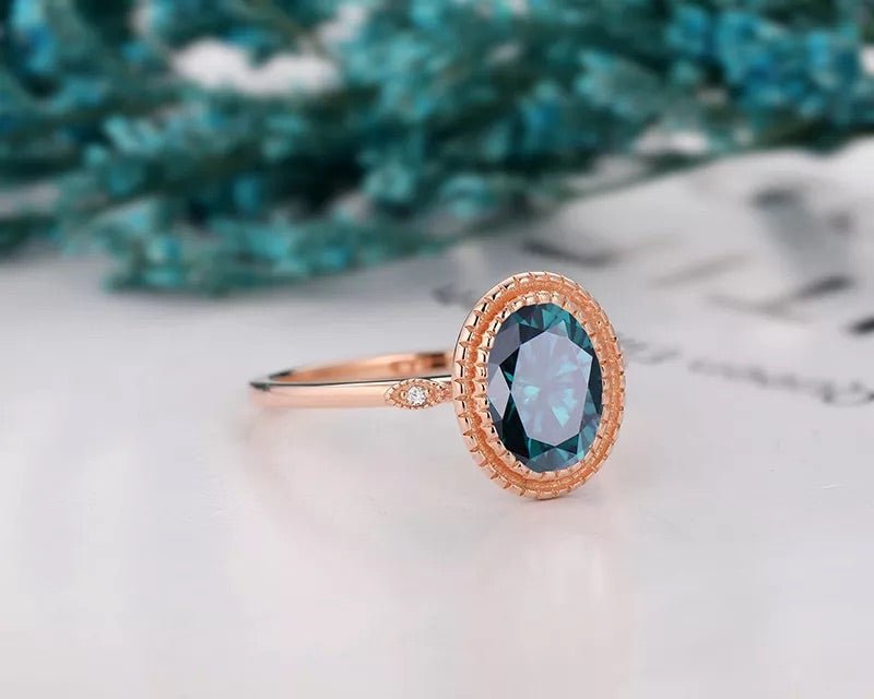 Unique Two Carat Oval Cut Genuine Blue Moissanite Engagement Ring in 14 Karat Rose Gold - Boutique Pavè